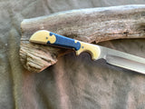 25-24 - Ivory Micarta & Blue Quilted Maple Puzzle Piece Carver