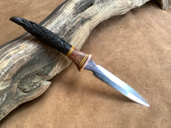 25-136 - Raven Carved Waterbuffalo Bodice Dagger