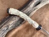 25-146 - Skull Stack Carved Deer Antler Carver