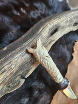 25-110 - Wolf with Celtic Knot Carved Deer Antler Drop Point Utility